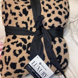 Cheetah print members mark blanket
